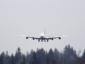 A Boeing Co. 747-400 airplane operated by Delta Airlines Inc. prepares to land at Paine Field in Everett, Washington, on Monday, Dec. 18, 2017.