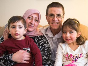 Ottawa academic Hassan Diab in his Ottawa home with his family, his wife Rania Tfaily, daughter Jena, 5, and son Jad, 3.