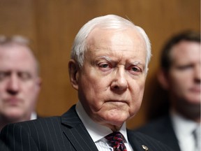FILE - In this Sept. 20, 2017, file photo, Sen. Orrin Hatch, R-Utah, listens during a Senate Judiciary Committee hearing on Capitol Hill in Washington. Hatch says he is retiring after four decades in Senate