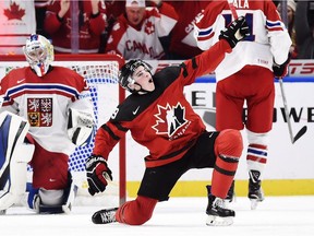 Drake Batherson celebrates after scoring one of his three goals for Canada in Thursday's semifinal win against the Czech Republic in the world junior championship at Buffalo.