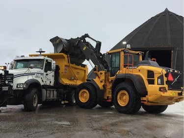 City road crews were loading up with salt Friday afternoon in preparation for the coming storm.