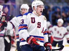 United States forward Kieffer Bellows celebrates a goal against Russia on Jan. 2, 2018