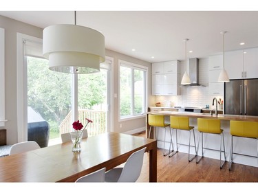 The renovated kitchen is open-concept, modern and takes advantage of natural light. It is now one of the family's favourite rooms in the house.