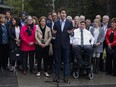 Prime Minister Justin Trudeau, centre, speaks to the media with his cabinet at a Liberal Party cabinet retreat in Kananaskis, Alta., Sunday, April 24, 2016. Trudeau's cabinet was lauded for being gender equal, and Shari Graydon argues more women should be featured publicly.