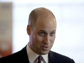 Britain's Prince William chats to guests at a reception after delivering a speech to celebrate the national rollout of the 'Step into Health' programme, at Chandos House in London, Thursday, Jan. 18, 2018. The initiative is supported by the Royal Foundation to help ex-service people, their spouses and dependants find employment in the National Health Service. The event was hosted by NHS Employers.