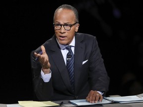 FILE - In this Sept. 26, 2016, file photo, moderator Lester Holt, anchor of NBC Nightly News, asks a question during the presidential debate at Hofstra University in Hempstead, N.Y. Holt says his trip to North Korea was valuable despite restrictions placed upon him by his hosts. Some critics accused NBC News of presenting an air-brushed depiction of the dictatorship. But Holt and other experts say there's a value to such trips despite the limitations.