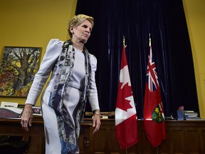 Ontario Premier Kathleen Wynne leaves a news conference at Legislative Assembly of Ontario in Toronto on Thursday Jan. 25, 2018.