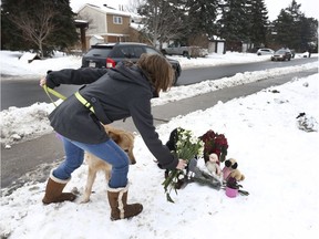 Stuffed animals and flowers were left on Seyton Drive in Ottawa Ontario Friday Jan 19, 2018. Nick Hickey was run over and killed by a car in Bells Corners. A man has been charged with murder.  Tony Caldwell