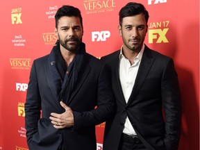 In this Jan. 8, 2018, file photo, Ricky Martin, left,  poses with Jwan Yosef.