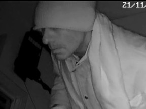 Police are seeking this unshaven suspect with a 'larger than average' nose in a Little Italy burglary last year.