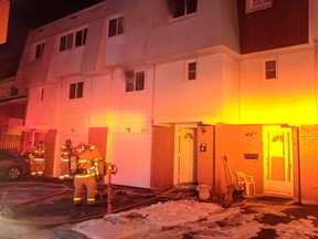 Ottawa firefighters at the scene of a fire on Romulus Private Monday night.