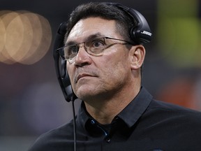 Carolina Panthers head coach Ron Rivera walks the sidelines Sunday, Dec. 31, 2017, in Atlanta.