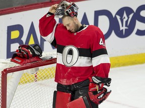 Ottawa Senators goaltender Craig Anderson (41) removes his helmet following a goal during NHL action in Ottawa on Thursday, January 18, 2018.