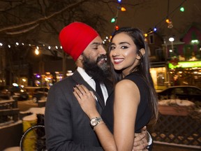 NDP Leader Jagmeet Singh poses with Gurkiran Kaur after proposing to her at an engagement party in Toronto, Tuesday January 16, 2018.
