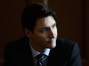 Prime Minister Justin Trudeau takes part in a round table discussion with