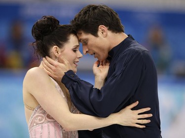 Tessa Virtue and Scott Moir of Canada compete in the ice dance free dance figure skating finals at the Iceberg Skating Palace during the 2014 Winter Olympics, Monday, Feb. 17, 2014, in Sochi, Russia.