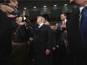 President Donald Trump arrives to deliver his first State of the Union Address to a joint session of Congress in the House chamber of the U.S. Capitol Tuesday, Jan. 30, 2018 in Washington.