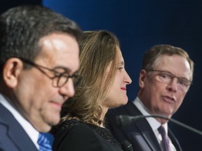 Foreign Affairs Minister Chrystia Freeland and Mexico's Secretary of Economy Ildefonso Guajardo Villarrea look on as United States Trade Representative Robert Lighthizer speaks.