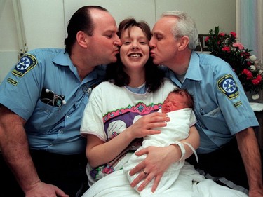 Ottawa 1998 Ice Storm - Tasha Geymonat gets kisses from paramedics Marc Lafleur, left, and Bill Magladry yesterday after they helped deliver her 8 lb. 4 oz. son in the back of a truck.