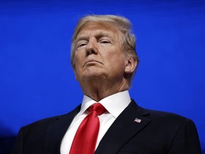 U.S. President Donald Trump arrives to delivers a speech to the World Economic Forum, Friday, Jan. 26, 2018, in Davos.