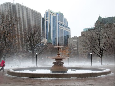 Fog hangs over the snow in Confederation Park as the region experiences a wide range of temperatures on Friday.