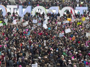 Protesters gather in Toronto's Nathan Phillips Square in support of the Women's March on Washington, on Jan. 21, 2017. Women will march again on Saturday in several Canadian and American cities.