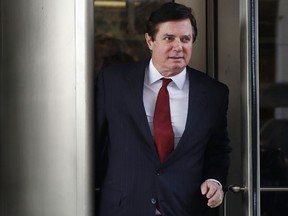 In this Nov. 6, 2017 photo, Paul Manafort, President Donald Trump's former campaign chairman, leaves the federal courthouse in Washington. Manafort has sued special counsel Robert Mueller saying he exceeded authority in the Russia probe.