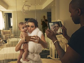 Kim Kardashian, North West, and Kanye West, Los Angeles, 2014.