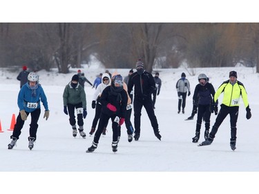 Athletes take part in the Winterlude Triathlon on the Rideau Canal skateway in Ottawa on Saturday, February 3, 2018.
