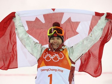 Mikael Kingsbury of Canada celebrates his gold medal victory in the men's moguls event at the Phoenix Snow Park during the 2018 Winter Olympics in Korea, February 12, 2018. Wind was an issue for some competitors.    Photo by Jean Levac/Postmedia