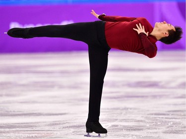 TOPSHOT - Canada's Patrick Chan competes in the figure skating team event men's single skating free skating during the Pyeongchang 2018 Winter Olympic Games at the Gangneung Ice Arena in Gangneung on February 12, 2018.