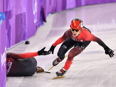 Canada's Charle Cournoyer competes in the men's 5,000m relay short track speed skating heat event during the Pyeongchang 2018 Winter Olympic Games, at the Gangneung Ice Arena in Gangneung on February 13, 2018.