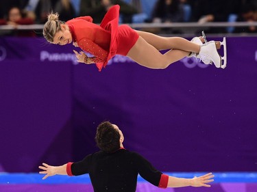 Canada's Kirsten Moore-Towers and Canada's Michael Marinaro compete in the pair skating short program of the figure skating event during the Pyeongchang 2018 Winter Olympic Games at the Gangneung Ice Arena in Gangneung on February 14, 2018.