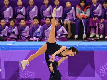 Canada's Meagan Duhamel and Canada's Eric Radford compete in the pair skating short program of the figure skating event during the Pyeongchang 2018 Winter Olympic Games at the Gangneung Ice Arena in Gangneung on February 14, 2018.