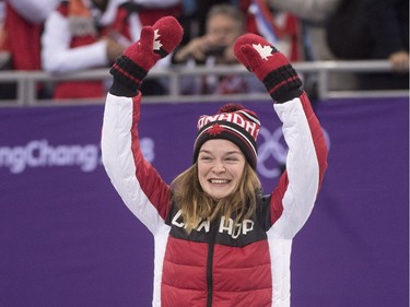 Women's 500-metre short-track speedskating bronze medalist Kim Boutin, of Canada, waves from the podium during victory ceremonies at the Pyeonchang Winter Olympics Tuesday, February 13, 2018 in Gangneung, South Korea.