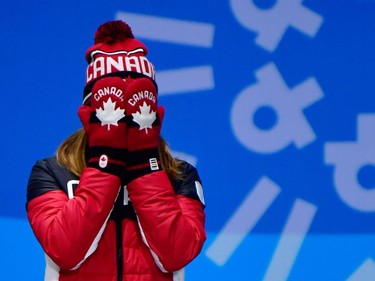 Canada's bronze medallist Kim Boutin cries of joy as she poses on the podium during the medal ceremony for the women's 500m short track at the Pyeongchang Medals Plaza during the Pyeongchang 2018 Winter Olympic Games in Pyeongchang on February 14, 2018.