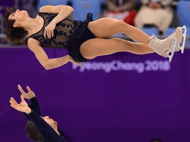 Canada's Meagan Duhamel and Canada's Eric Radford compete in the pair skating short program of the figure skating event during the Pyeongchang 2018 Winter Olympic Games at the Gangneung Ice Arena in Gangneung on February 14, 2018.