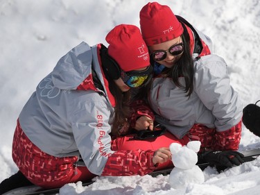 Volunteers make a snowman during the snowboard cross event at the Phoenix Park during the Pyeongchang 2018 Winter Olympic Games on February 15, 2018 in Pyeongchang.