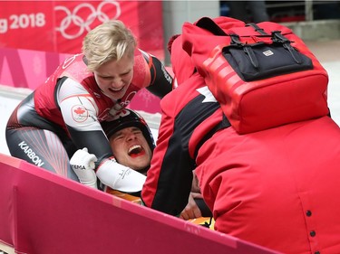 Canada celebrates after their performance in the luge team relay competition during the 2018 Winter Olympics in Korea, February 15, 2018.
