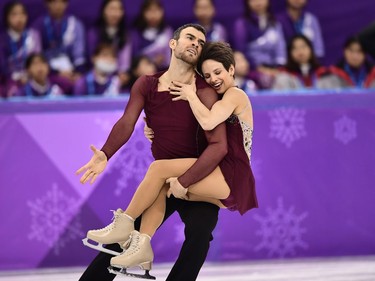 Canada's Meagan Duhamel and Canada's Eric Radford compete in the pair skating free skating of the figure skating event during the Pyeongchang 2018 Winter Olympic Games at the Gangneung Ice Arena in Gangneung on February 15, 2018.