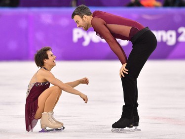 Canada's Meagan Duhamel and Canada's Eric Radford compete in the pair skating free skating of the figure skating event during the Pyeongchang 2018 Winter Olympic Games at the Gangneung Ice Arena in Gangneung on February 15, 2018.