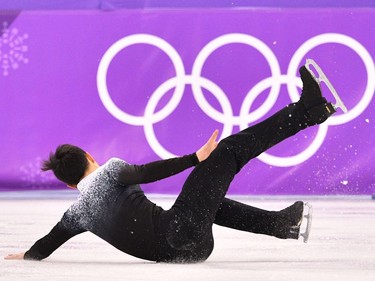 Canada's Patrick Chan falls as he competes in the men's single skating short program of the figure skating event during the Pyeongchang 2018 Winter Olympic Games at the Gangneung Ice Arena in Gangneung on February 16, 2018.