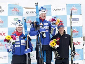 Petter Soleng-Skinstad, middle, winner of the 51-kilometre classic race in the Gatineau Loppet, stands between second-place Andy Shields, right, and his brother, third-place finisher Maarten Soleng-Skinstad, during medal presentations on Saturday. Patrick Doyle/Postmedia