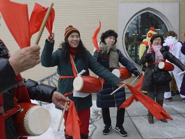 Members of various Chinese community groups volunteer to perform flower drum dance prior to Chinese New Year celebration at Plant recreation centre on Saturday, Feb. 17, 2018.