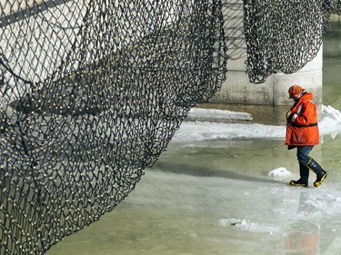 Annual ice blasting on the Rideau River continues on Sunday near the Rideau Falls.  Ashley Fraser/Postmedia