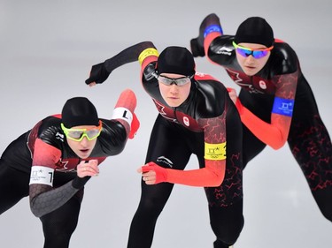 Front to rear: Canada's Ivanie Blondin, Canada's Josie Morrison and Canada's Isabelle Weidemann compete in the women's team pursuit final B speed skating event during the Pyeongchang 2018 Winter Olympic Games at the Gangneung Oval in Gangneung on February 21, 2018.
