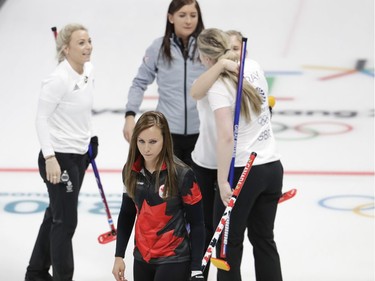 Canada's skip Rachel Homan, center, leaves the ice after loosing a women's curling match against Britain at the 2018 Winter Olympics in Gangneung, South Korea, Wednesday, Feb. 21, 2018.