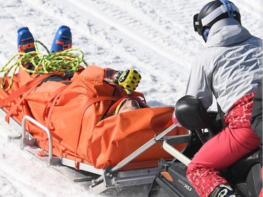 Canada's Christopher Delbosco is evacuated after being injured during the men's ski cross 1/8 final event during the Pyeongchang 2018 Winter Olympic Games at the Phoenix Park in Pyeongchang on February 21, 2018.