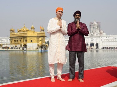 Prime Minister Justin Trudeau and Minister of National Defence Minister Harjit Singh Sajjan visit the Golden Temple in Amritsar, India on Wednesday, Feb. 21, 2018.