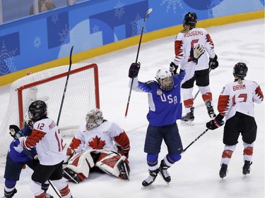 Hilary Knight (21), of the United States, celebrates after scoring a goal against Canada during the first period of the women's gold medal hockey game at the 2018 Winter Olympics in Gangneung, South Korea, Thursday, Feb. 22, 2018.